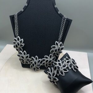 Bejeweled statement style jewelry set necklace and bracelet.